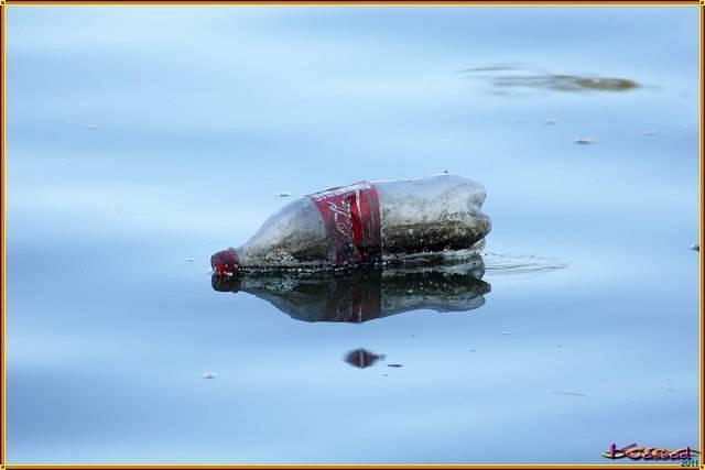 Dirty ship on blue water